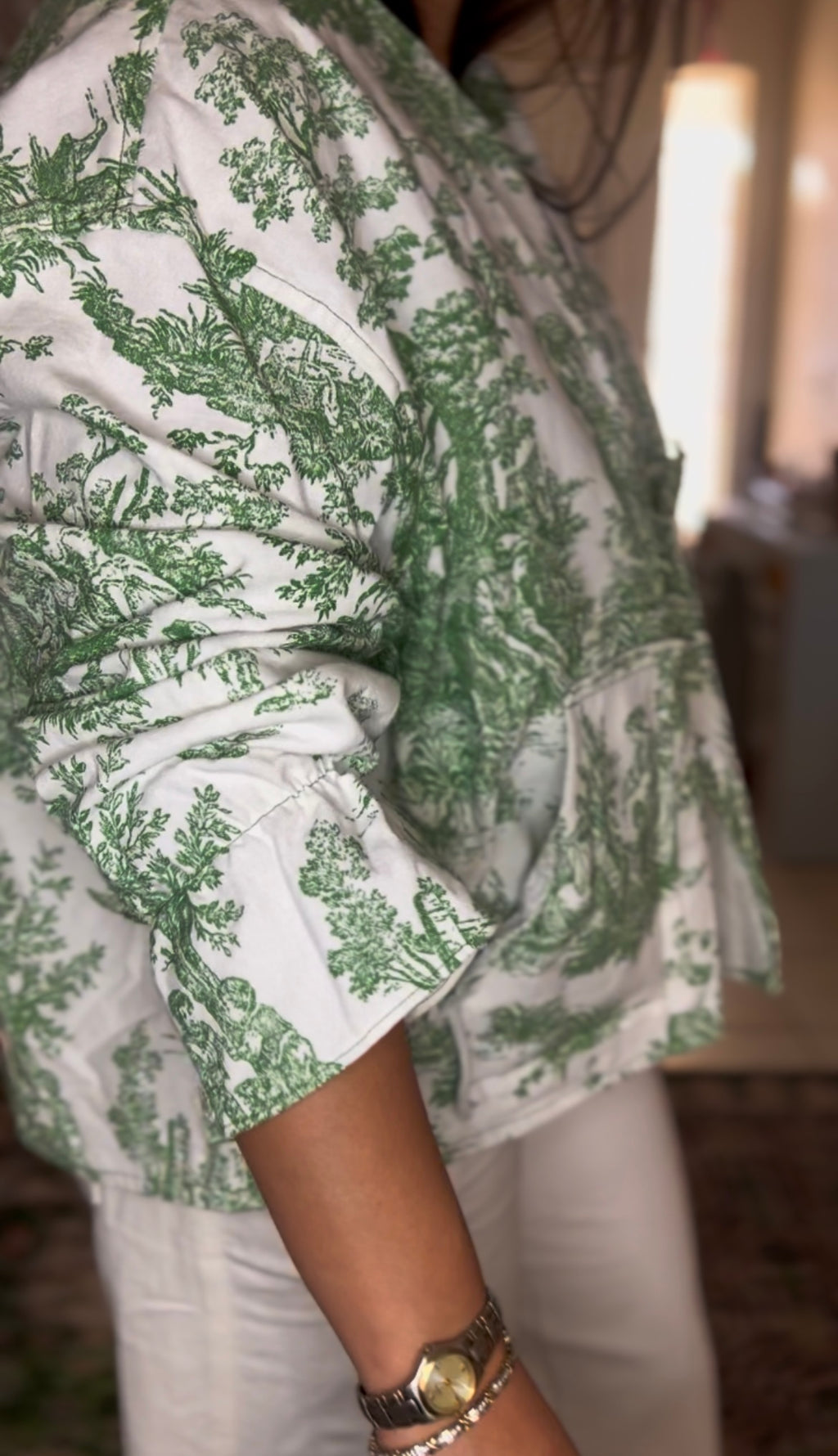 Handmade lightweight jacket featuring vintage green toile print on white cotton. This one of a kind piece is crafted from rescued deadstock fabric, combining preppy elegance with southern charm-  made in the USA. 