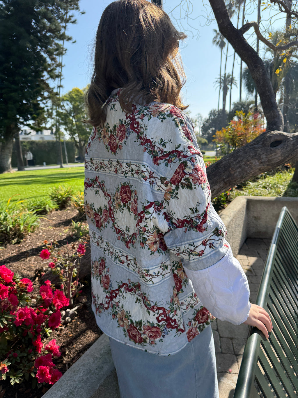 One of a kind handmade jacket crafted from upcycled floral and ticking stripe cotton. Featured romantic rose print panels, vintage inspired playful cottage core silhouette. Ethically made from deadstock fabric and sewn in the USA. 